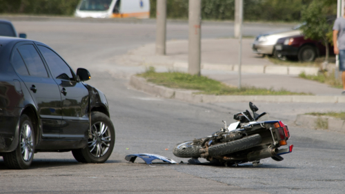 Car and motorcycle accident scene illustrating Florida wrongful death case