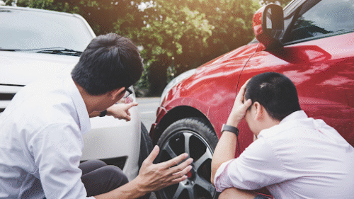 Driver and pedestrian navigating winter holiday conditions in Florida to avoid seasonal accidents
